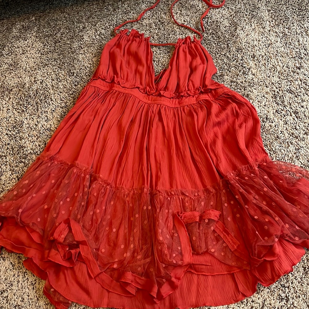 Woman’s Vibrant Dark Orange Dress